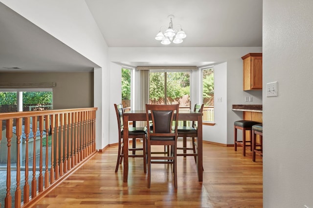 8115 E Sommerset Dr, Spokane, WA 99212 - dining area with light wood finished floors and a chandelier