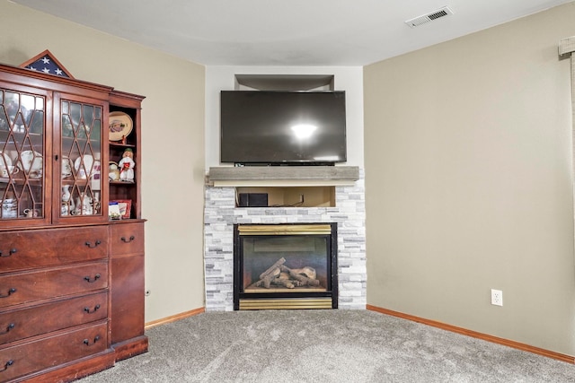 8115 E Sommerset Dr, Spokane, WA 99212 - living area featuring carpet floors, baseboards, and a stone fireplace