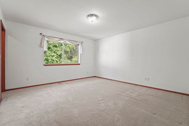 8115 E Sommerset Dr, Spokane, WA 99212 - carpeted spare room with baseboards