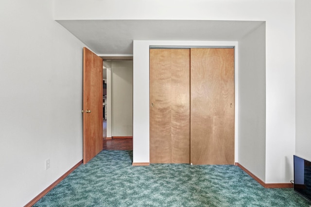 8115 E Sommerset Dr, Spokane, WA 99212 - unfurnished bedroom featuring carpet flooring, baseboards, and a closet