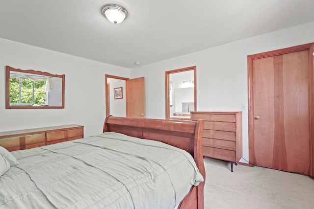 8115 E Sommerset Dr, Spokane, WA 99212 - bedroom with light carpet and ensuite bathroom