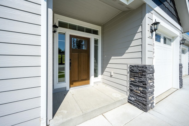 10697 N Crimson Dr, Hayden, ID 83835 - doorway to property with a garage