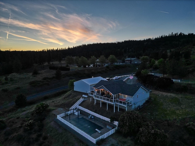 6930 N N Lynden Ln, Otis Orchards, WA 99027 - aerial view of property and surrounding area featuring a heavily wooded area