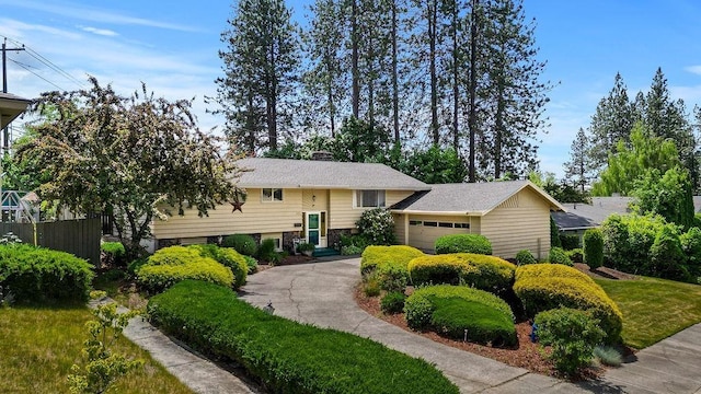 4323 W Janice Ave, Spokane, WA 99208 - view of front facade with an attached garage and driveway