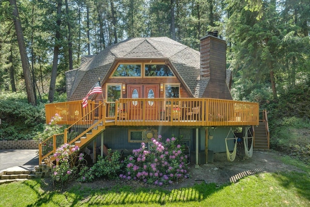 1411 W Spring Ln, Spokane, WA 99218 - back of house featuring stairs, a deck, a chimney, and roof with shingles
