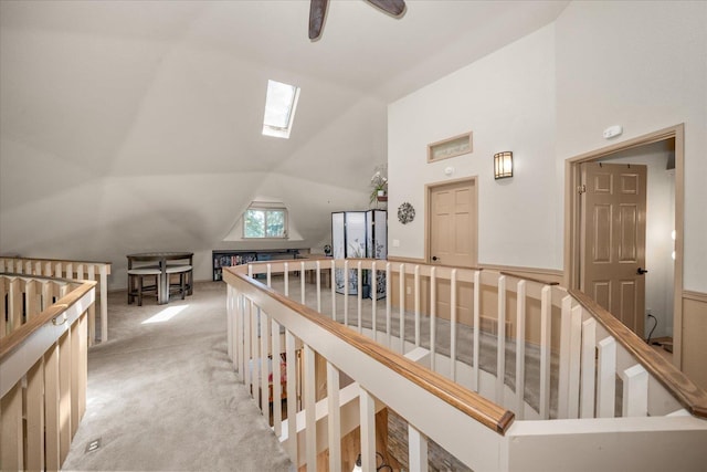 1411 W Spring Ln, Spokane, WA 99218 - hallway featuring a skylight, lofted ceiling, and carpet