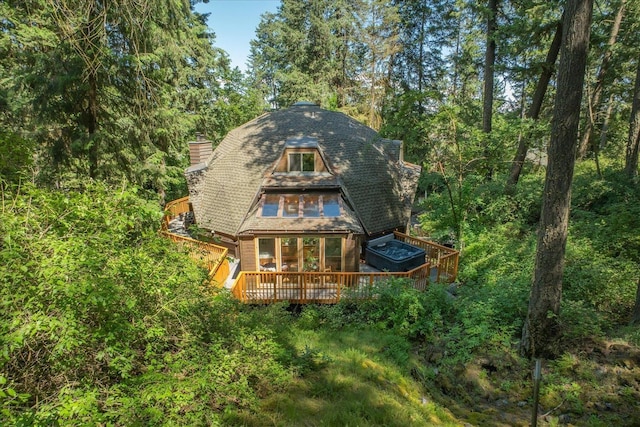 1411 W Spring Ln, Spokane, WA 99218 - rear view of house featuring a chimney and a deck