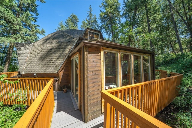 1411 W Spring Ln, Spokane, WA 99218 - deck featuring a sunroom