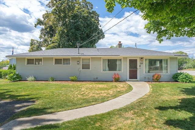 519 N Bannen Rd, Spokane Valley, WA 99216 - single story home with a front yard and a chimney