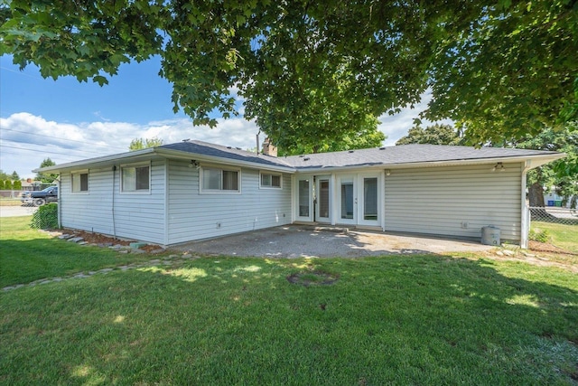519 N Bannen Rd, Spokane Valley, WA 99216 - rear view of property with french doors, a patio area, and a chimney