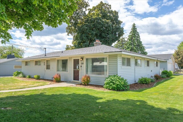 519 N Bannen Rd, Spokane Valley, WA 99216 - single story home with a front yard and a chimney