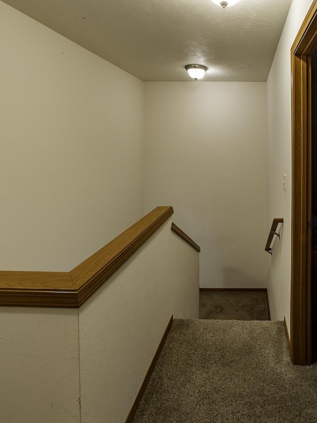 9705 E 4th Ave Unit 9707, Spokane Valley, WA 99206 - stairway featuring carpet floors