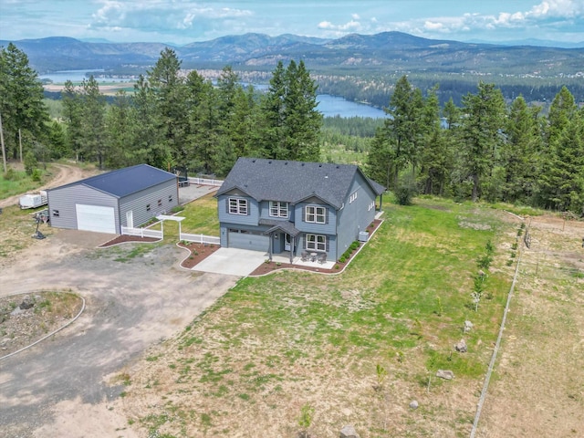 13616 W Pine Bluff Rd, Nine Mile Falls, WA 99026 - aerial view of property and surrounding area featuring a mountain backdrop and a forest