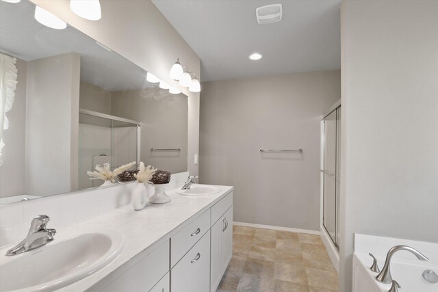 13616 W Pine Bluff Rd, Nine Mile Falls, WA 99026 - full bathroom with a shower stall, double vanity, a bath, and recessed lighting