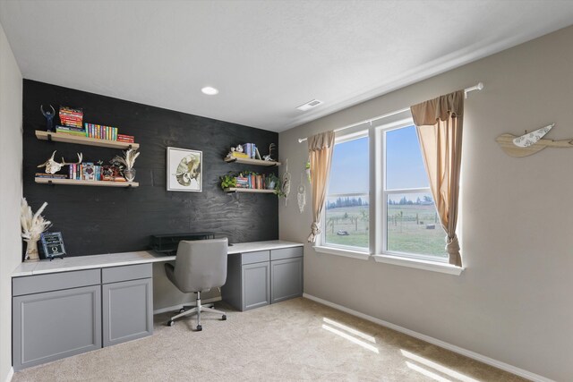 13616 W Pine Bluff Rd, Nine Mile Falls, WA 99026 - office space with built in desk, baseboards, light colored carpet, an accent wall, and recessed lighting