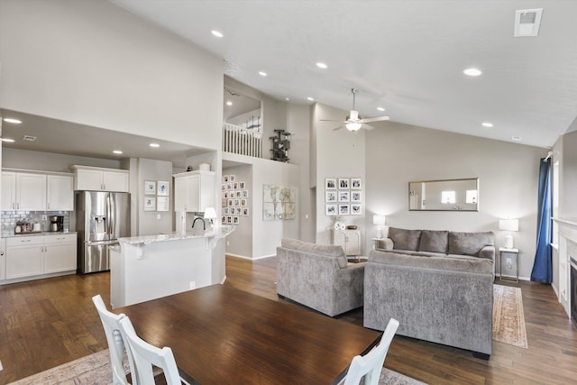 13616 W Pine Bluff Rd, Nine Mile Falls, WA 99026 - dining area featuring ceiling fan, high vaulted ceiling, dark wood-type flooring, and recessed lighting