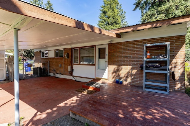 6721 N Howard St, Spokane, WA 99208 - wooden terrace with an attached carport