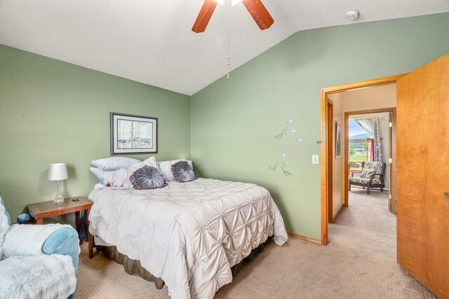 23823 E Garland Ave, Otis Orchards, WA 99027 - bedroom featuring vaulted ceiling, light carpet, baseboards, and a ceiling fan