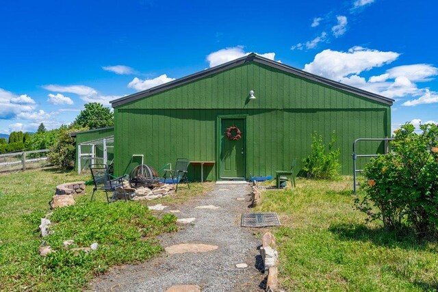 23823 E Garland Ave, Otis Orchards, WA 99027 - view of outdoor structure with an outdoor fire pit