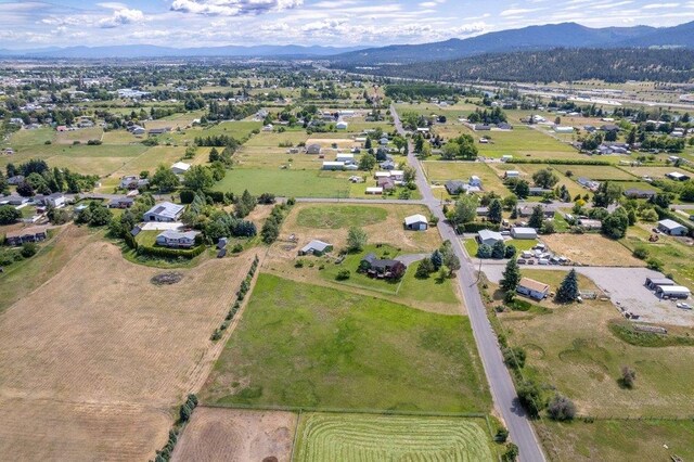 23823 E Garland Ave, Otis Orchards, WA 99027 - aerial view of property and surrounding area with a mountainous background