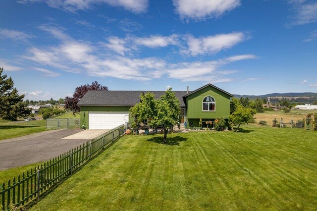 23823 E Garland Ave, Otis Orchards, WA 99027 - view of front of house with driveway and a garage
