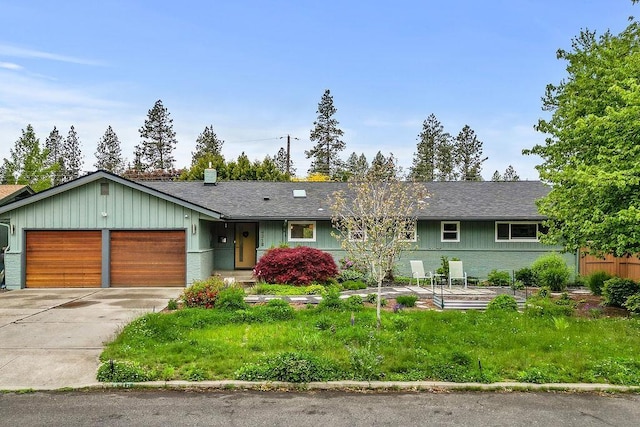 4318 S Magnolia St, Spokane, WA 99203 - ranch-style home featuring an attached garage, concrete driveway, and roof with shingles