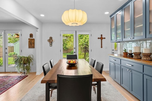 4318 S Magnolia St, Spokane, WA 99203 - dining area featuring french doors, light wood-style flooring, recessed lighting, and baseboards