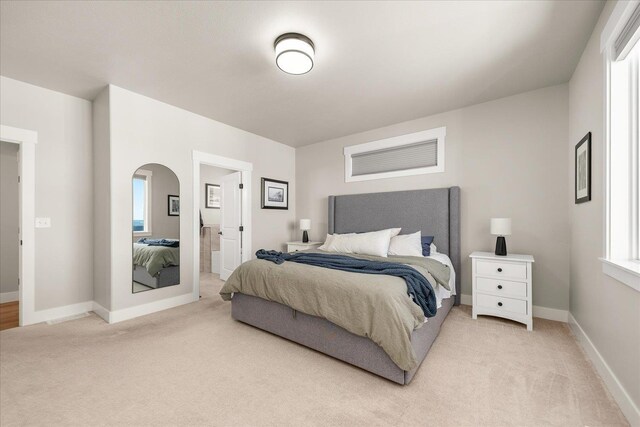 1616 S Morningside Heights Dr, Greenacres, WA 99016 - bedroom featuring light colored carpet, baseboards, and connected bathroom