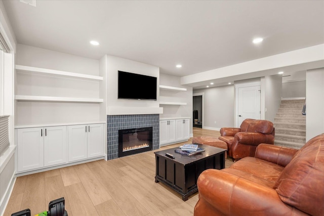 1616 S Morningside Heights Dr, Greenacres, WA 99016 - living room with light wood-style floors, a fireplace, recessed lighting, stairs, and baseboards