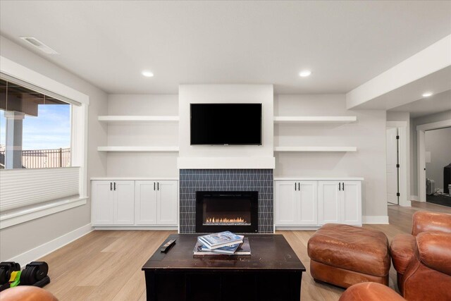 1616 S Morningside Heights Dr, Greenacres, WA 99016 - living room with a fireplace, light wood-style floors, baseboards, and recessed lighting