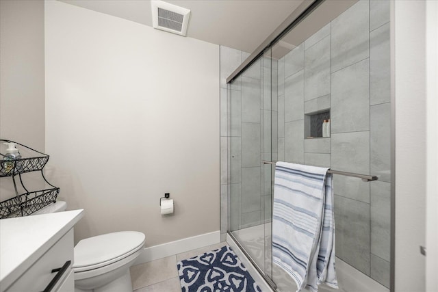 1616 S Morningside Heights Dr, Greenacres, WA 99016 - full bathroom with toilet, a shower stall, tile patterned flooring, vanity, and baseboards