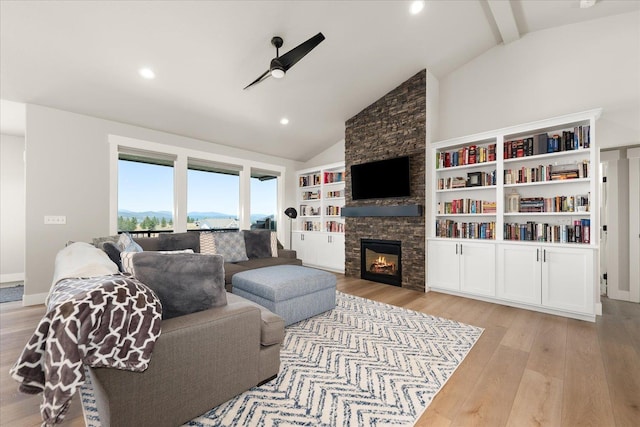 1616 S Morningside Heights Dr, Greenacres, WA 99016 - living room featuring light wood-style flooring, a stone fireplace, high vaulted ceiling, beamed ceiling, and recessed lighting