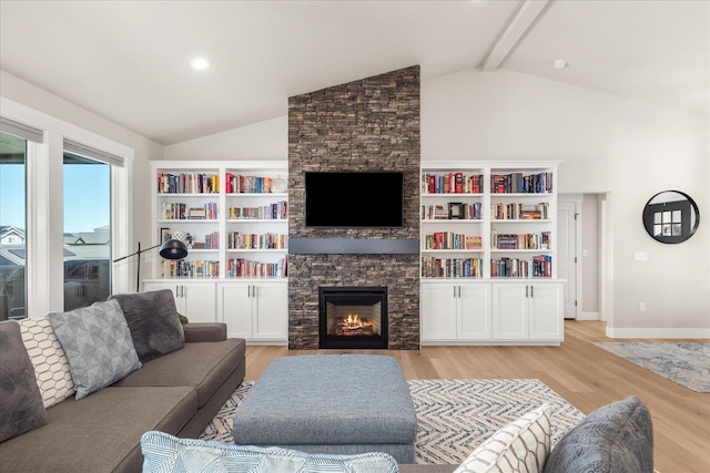 1616 S Morningside Heights Dr, Greenacres, WA 99016 - living area featuring a stone fireplace, light wood-type flooring, and baseboards