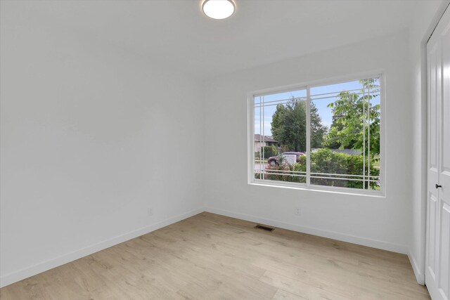 415 S Mckee St, Spokane Valley, WA 99016 - unfurnished room featuring baseboards and light wood finished floors