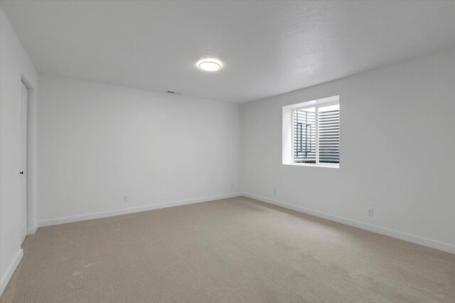 415 S Mckee St, Spokane Valley, WA 99016 - unfurnished room with light colored carpet and baseboards