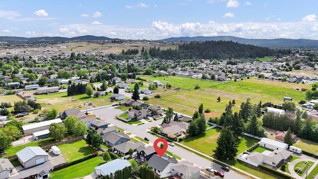 415 S Mckee St, Spokane Valley, WA 99016 - aerial perspective of suburban area featuring mountains