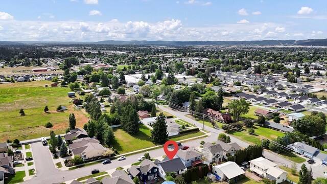 415 S Mckee St, Spokane Valley, WA 99016 - aerial view of property's location with nearby suburban area