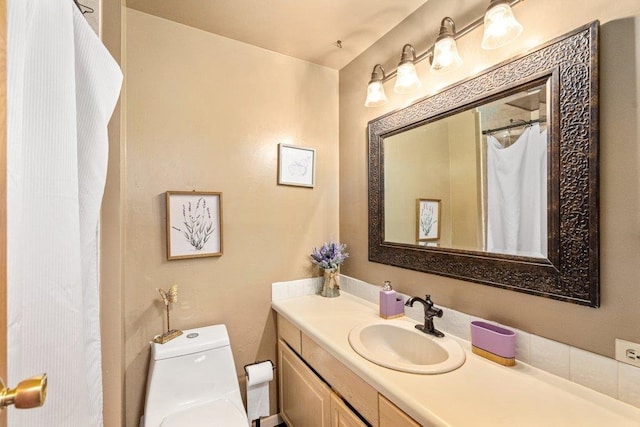 3225 E 16th Ave, Spokane, WA 99223 - full bath with vanity, toilet, and a shower with curtain