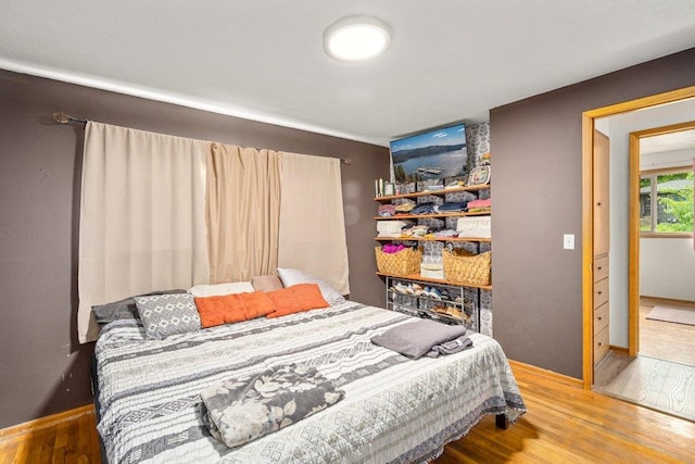 3225 E 16th Ave, Spokane, WA 99223 - bedroom featuring wood finished floors and baseboards