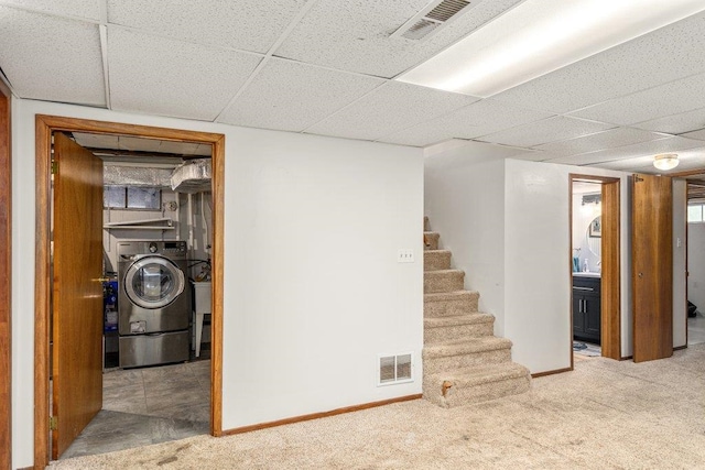 3225 E 16th Ave, Spokane, WA 99223 - finished basement featuring washer / dryer, a paneled ceiling, carpet, stairway, and baseboards