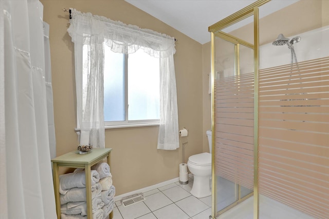 491 Eastshore Rd, Newport, WA 99156 - full bath with a stall shower, toilet, tile patterned floors, and baseboards