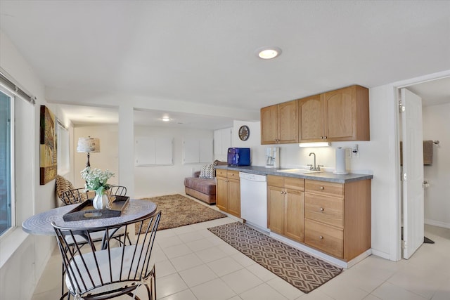 491 Eastshore Rd, Newport, WA 99156 - kitchen with white dishwasher, a sink, baseboards, recessed lighting, and open floor plan