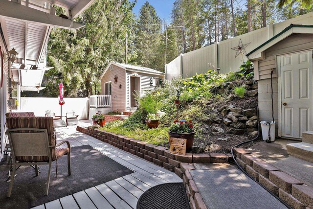 491 Eastshore Rd, Newport, WA 99156 - wooden terrace with an outdoor structure