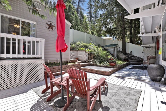 491 Eastshore Rd, Newport, WA 99156 - wooden terrace with a fenced backyard