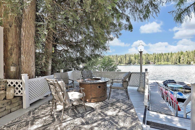 491 Eastshore Rd, Newport, WA 99156 - dock area with a water view, a forest view, and a fire pit