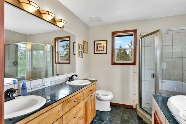 6533 D Lois Way, Nine Mile Falls, WA 99026 - full bath with a stall shower, double vanity, a bath, and toilet