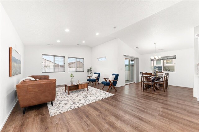 3105 N Rio Grande Rd, Spokane Valley, WA 99027 - living room featuring lofted ceiling, plenty of natural light, baseboards, wood finished floors, and recessed lighting