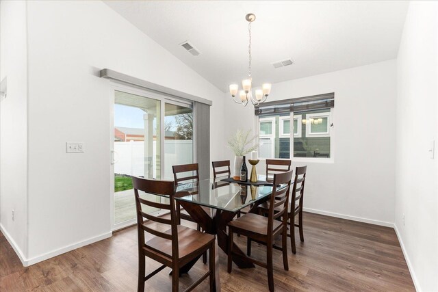3105 N Rio Grande Rd, Spokane Valley, WA 99027 - dining area featuring a chandelier, wood finished floors, lofted ceiling, and baseboards