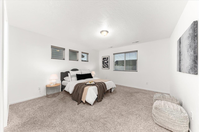 3105 N Rio Grande Rd, Spokane Valley, WA 99027 - bedroom with carpet flooring, a textured ceiling, and baseboards