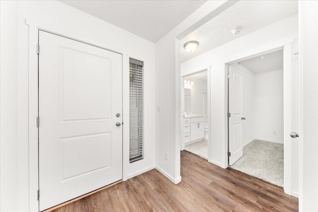 3105 N Rio Grande Rd, Spokane Valley, WA 99027 - entrance foyer featuring light wood-style floors and baseboards